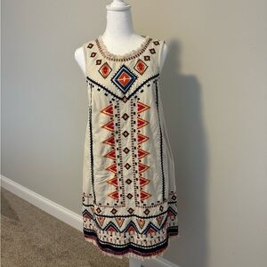 Sleeveless dress multi colored. Never worn. Beautiful summer dress.